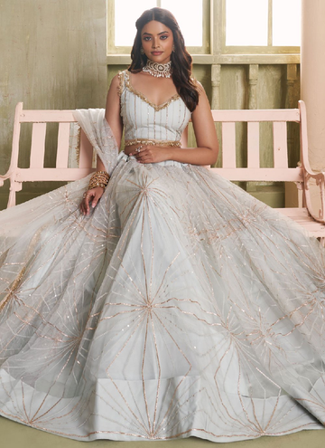 Amazing white soft net lehenga choli with sequin and zari embroidery work